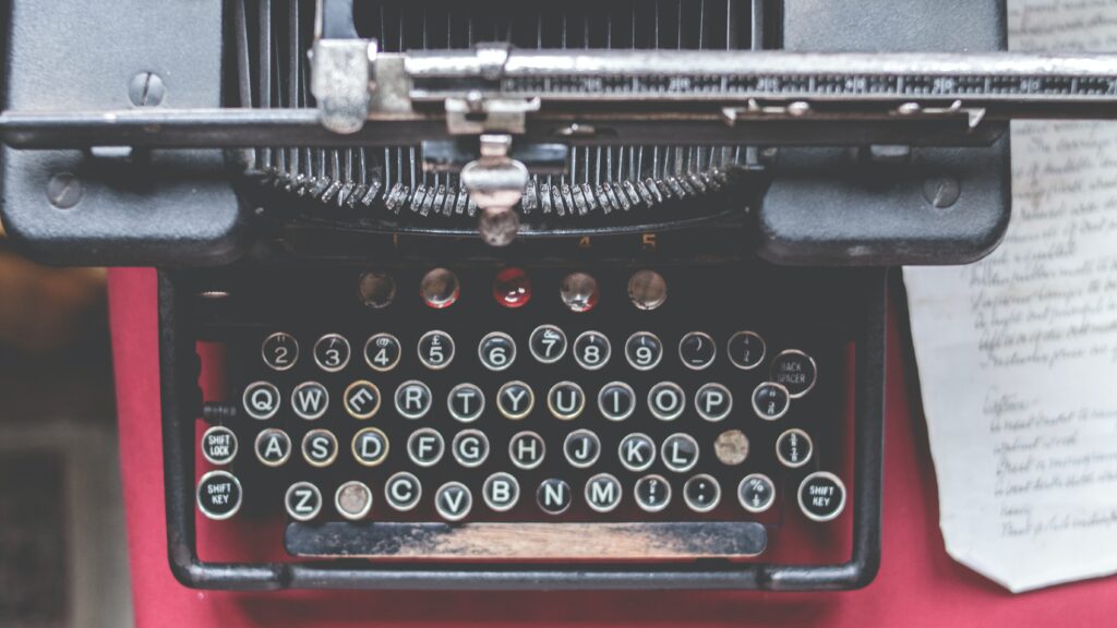 A photo of a red typewriter